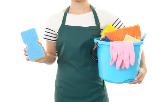 Airbnb cleaning professional preparing a rental living room