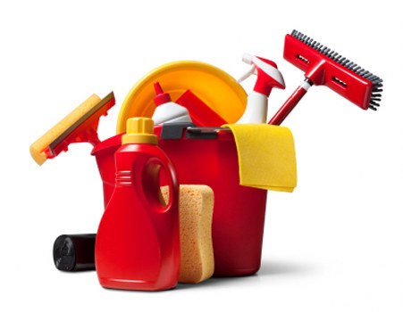 Vacuuming fabric upholstery during sofa cleaning